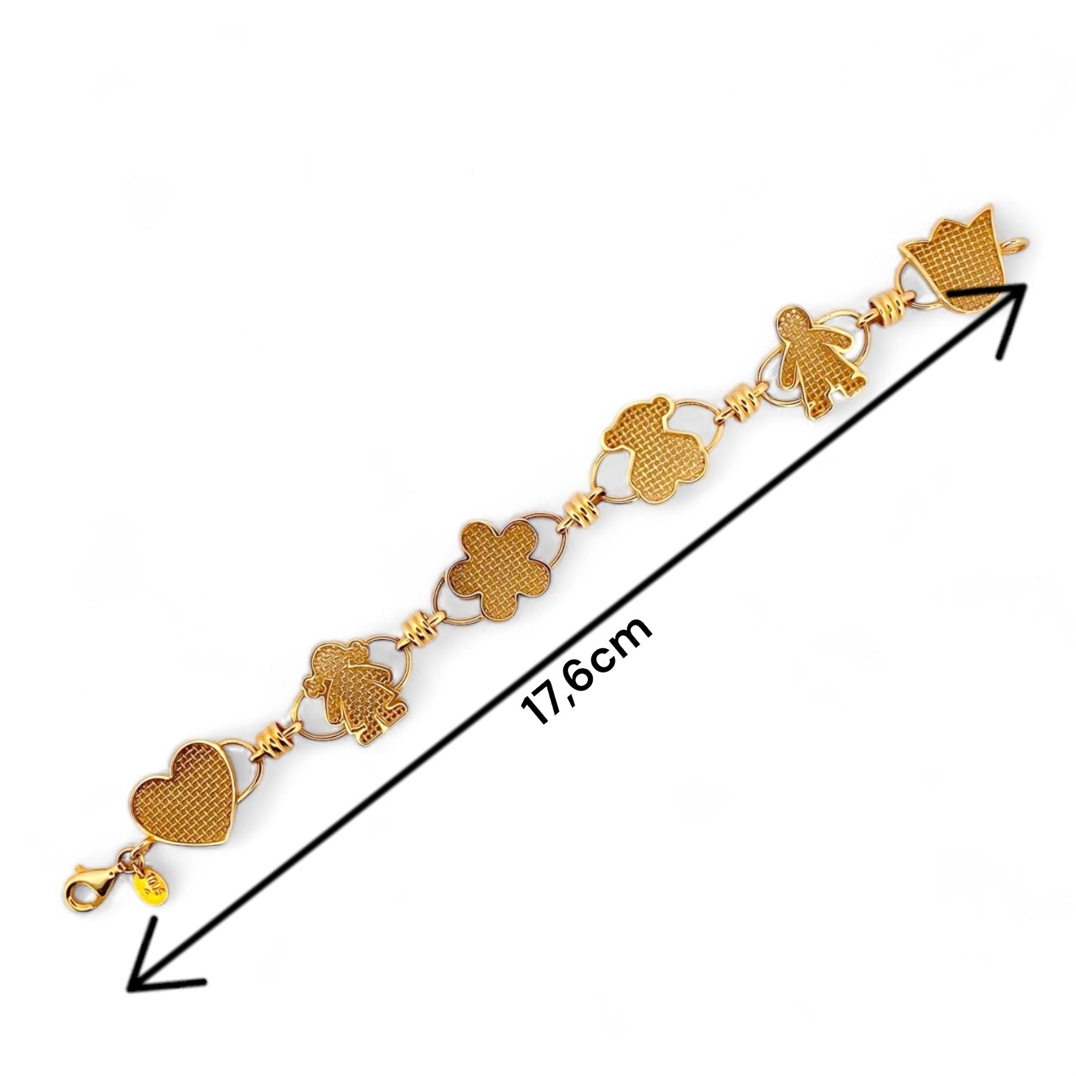 Pulsera original de Tous calada de Oro de 18kt y piezas con motivos de tulipán, osito flor, niña y corazón y cierre tipo mosquetón. La pulsera mide 17,8cm y las piezas 15,86mm. Esta pieza ha sido restaurada en nuestro taller de Barcelona. Compro Oro al mejor precio, joyería segunda mano Barcelona, diseño y transformación de joyas.