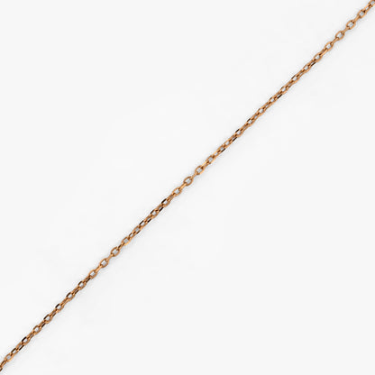 Collar original de la firma Tous de oro de 18kt con cadena de 40cm de largo y colgantes en forma de osito, corazón, tulipán y flor en oro. Con cierre tipo reasa.