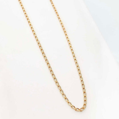 Collar de oro de 18kt con cadena tipo barbada de oro de 18kt con un cierre tipo reasa. Joyería Ian'Or Barcelona. Joyas de segunda mano baratas. Envío gratis.