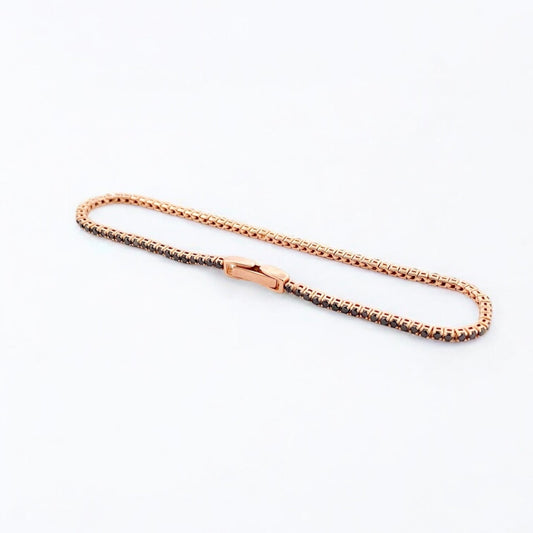 Pulsera fina semirrígida realizada en oro rosa de 18kt con ónix negros talla brillante. Joyas restauradas. Envío gratis. Joyas con diamantes baratas. Ian'or.