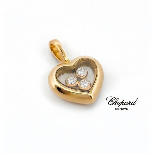 Colgante en forma corazón realizado en oro amarillo de 18kt de la prestigiosa firma Chopard. Modelo Happy diamonds icons. Envío gratuito. Joyas Chopard.