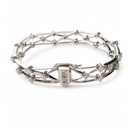 Comprar pulsera con formas geométricas realizada en oro blanco de 18kt con diamantes talla brillante. Joyas con diamantes baratas en Barcelona. Envío gratis.


