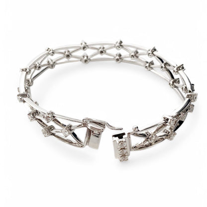 Comprar pulsera con formas geométricas realizada en oro blanco de 18kt con diamantes talla brillante. Joyas con diamantes baratas en Barcelona. Envío gratis.

