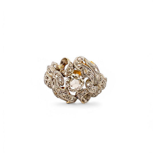 Comprar anillo antiguo en oro amarillo de 18kt con un brillante central y pequeños diamantes talla antigua engastados en platino. Joyas vintage segunda mano. 