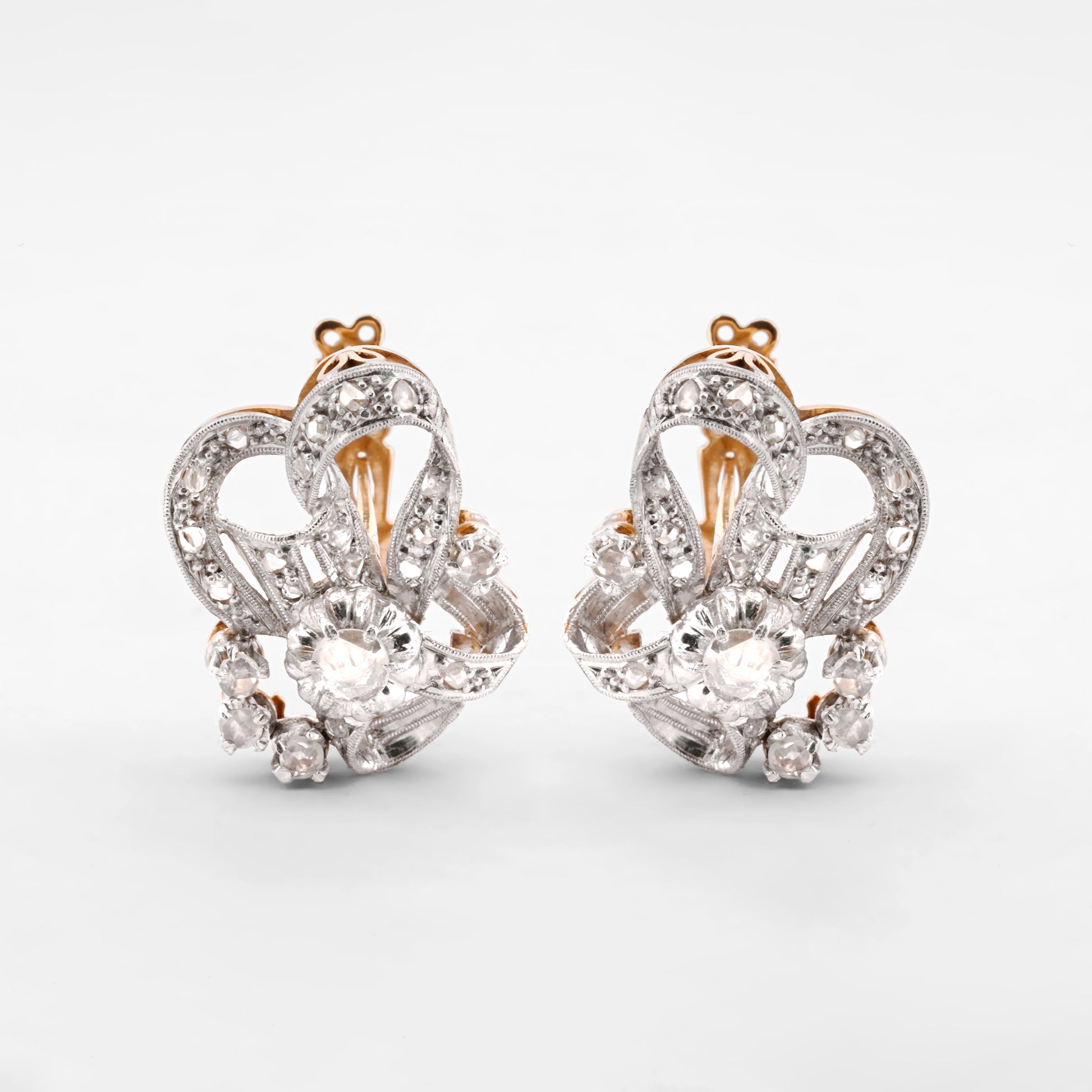 Comprar pendientes vintage de oro amarillo de 18kt con diamantes talla antigua engastados en platino. Joyas vintage de oro y platino de segunda mano. Ian'Or.