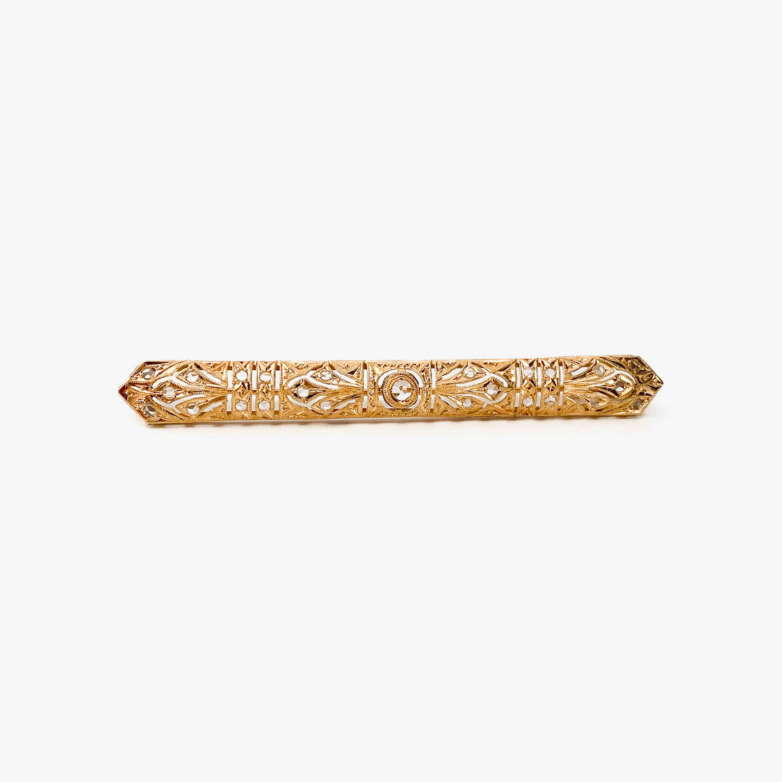 Broche vintage art decó tipo alfiler realizado en Oro amarillo de 18kt con pequeños&nbsp; diamantes talla antigua y un diamante central de 2,5mm.  Broches de oro vintage para novias.