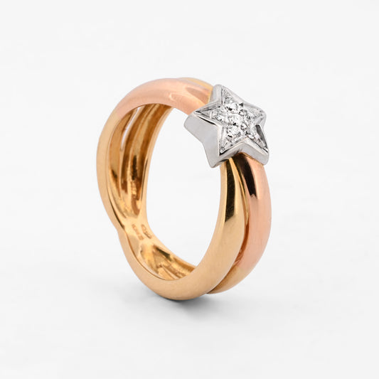 Comprar anillo realizado en oro blanco, rosa y amarillo de 18kt con estrella central con 6 diamantes talla brillante. Joyas de oro 18kt. Envío gratis