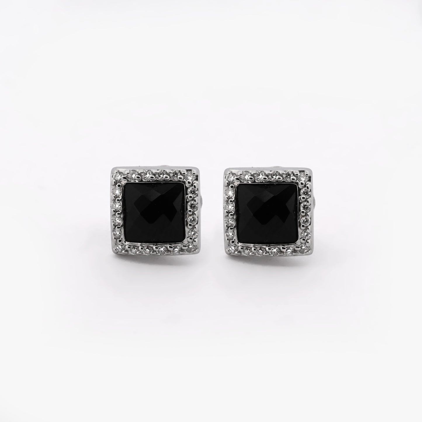 Comprar pendientes realizados en oro blanco de 18kt originales de la firma TOUS con ónix guardado y diamantes talla brillante alrededor. Joyas Tous restauradas.