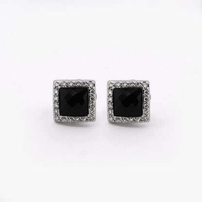 Comprar pendientes realizados en oro blanco de 18kt originales de la firma TOUS con ónix guardado y diamantes talla brillante alrededor. Joyas Tous restauradas.
