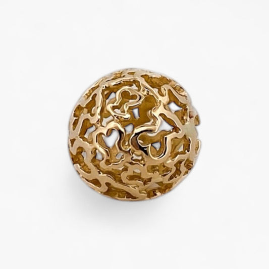 Comprar colgante en forma de bola hueca con la silueta de los icónicos ositos de la firma Tous en oro amarillo de 18kt. Venta de joyas Tous segunda mano.