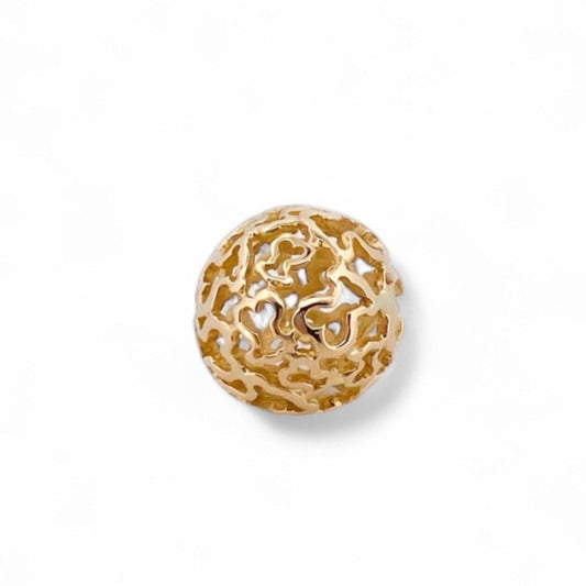 Comprar colgante en forma de bola hueca con la silueta de los icónicos ositos de la firma Tous en oro amarillo de 18kt. Venta de joyas Tous segunda mano.