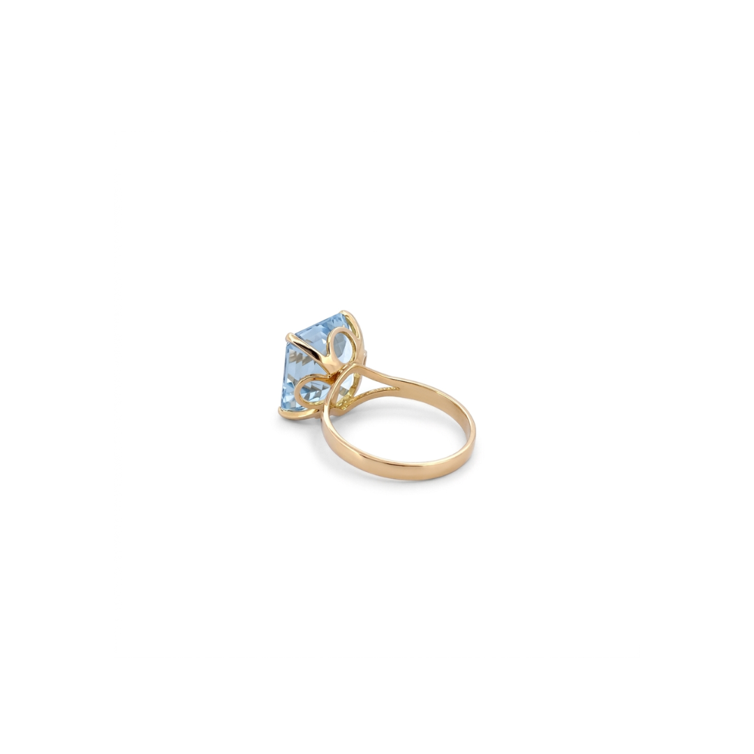Comprar anillo de oro amarillo de 18kt con topacio talla baguette engastado en 4 grapas. Joyas restauradas. Joyas de segunda mano. Joyería Ian'Or.
