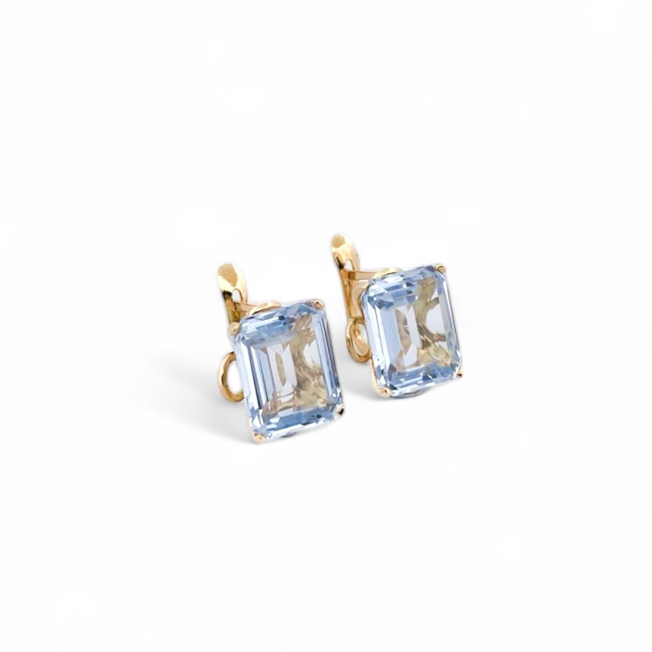 Comprar pendientes realizados en oro amarillo de 18kt con un topacio talla baguette en cada pendiente y cierre catalán. Joyas restauradas. Joyería Ian'Or.