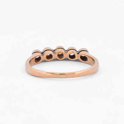 Comprar sortija de oro amarillo de 18kt con carril de 5 diamantes talla brillantes de 0,04ct cada uno y 0,20ct en total. Joyería Ian'Or. Envío gratuito.