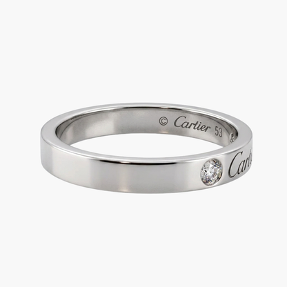 Comprar alianza de la prestigiosa firma Cartier realizada en platino y con dos diamantes talla brillante engastados. Cartier de segunda mano. Joyería Ian'Or.