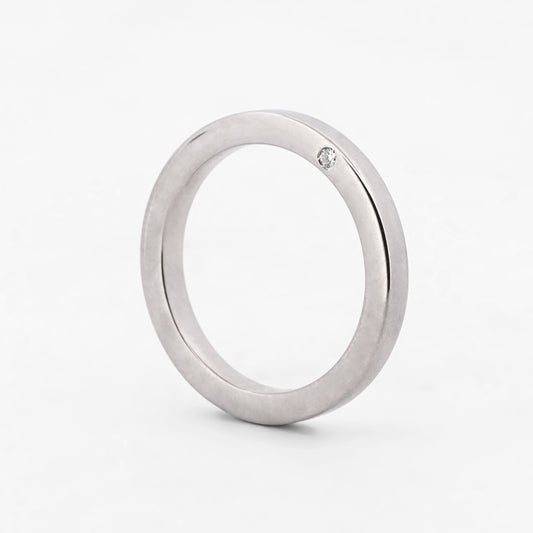 Comprar alianza de la firma TOUS realizada en oro blanco de 18kt con brillante lateral. Anillos de compromiso Tous. Envío gratis. Joyería Ian'Or.