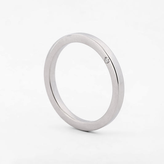 Comprar alianza de la firma TOUS realizada en oro blanco de 18kt con brillante lateral. Anillos de compromiso Tous. Envío gratis. Joyería Ian'Or.