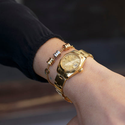Reloj Rolex Datejust de Mujer caja de 26mm. Realizado en oro amarillo de 18kt.
Medida correa: 19cm, correa oyster. Rolex de segunda mano baratos en Barcelona. 