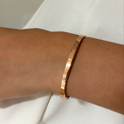 Comprar pulsera esclava de la prestigiosa firma Cartier realizada en oro rosa de 18kt. Joyas Cartier baratas. Joyería Ian'Or. Envío GRATIS.

