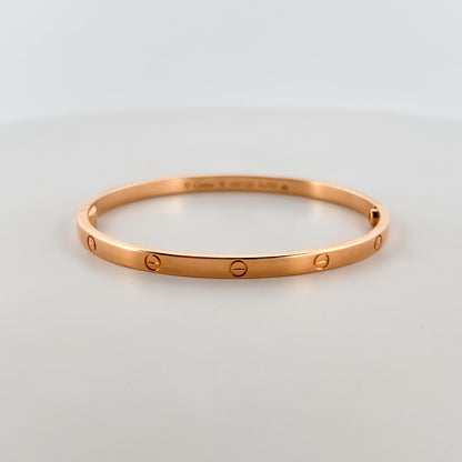 Comprar pulsera esclava de la prestigiosa firma Cartier realizada en oro rosa de 18kt. Joyas Cartier baratas. Joyería Ian'Or. Envío GRATIS.
