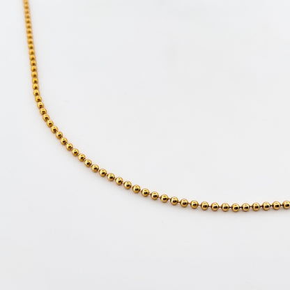 Cadena bolitas de oro malla estilo militar realizada en oro amarillo de 18kt. Esta cadena dispone de cierre tipo mosquetó  46,3cm x 1,53mm. Cadenas de oro 18kt baratas