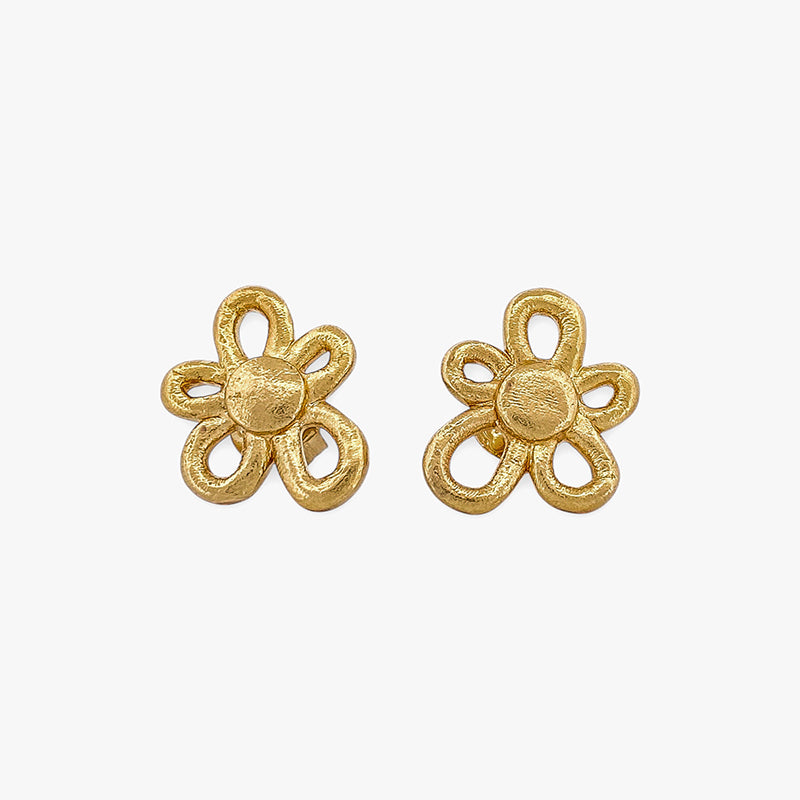 Comprar pendientes realizados en oro amarillo de 18kt con textura, de la firma TOUS en forma de flor irregular. Joyas Tous acondicionadas. Joyería Ian'Or.
