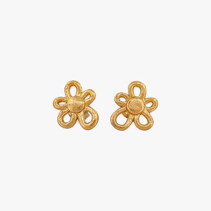 Comprar pendientes realizados en oro amarillo de 18kt con textura, de la firma TOUS en forma de flor irregular. Joyas Tous acondicionadas. Joyería Ian'Or.