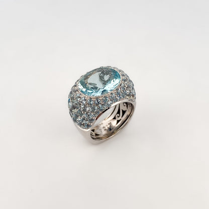Comprar anillo de la firma Sillam realizado en oro blanco de 18kt con aguamarina central y talla brillante alrededor y en los brazos del anillo. Envío GRATIS.

