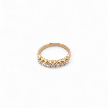 Comprar media alianza de oro amarillo de 18kt con 7 brillantes engastados en grapas. Joyas de segunda mano. Envío GRATIS. Anillos de compromiso baratos.

