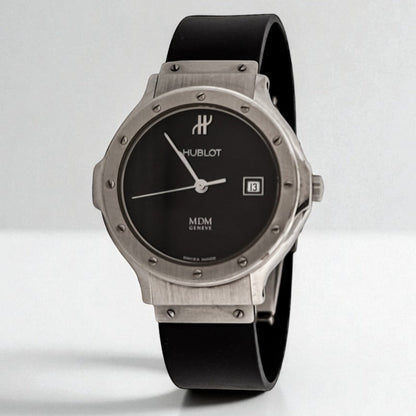 Compar Reloj mujer de la firma Hublot realizado en caucho negro y acero, esfera negra de 28mm con cristal de zafiro y sin cifras. Relojes Hublot de segunda mano baratos Barcelona.