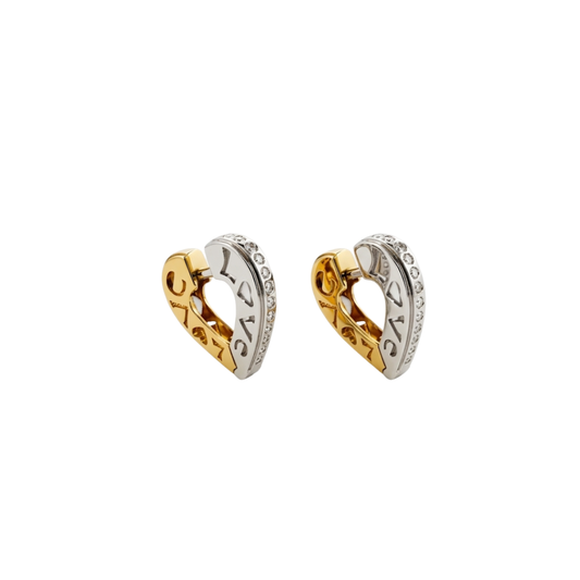 Comprar pendientes tipo criollas de oro bicolor  blanco y amarillo de 18kt de 1,9c.  La parte interior es calada con texto LOVE y la parte exterior lleva un carril de diamantes 