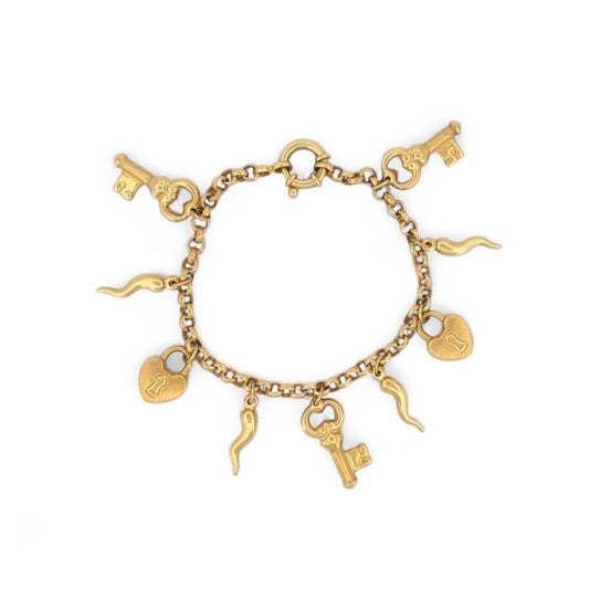 Comprar pulsera realizada en oro amarillo de 18kt con colgantes en forma de llaves y candados. Cierre tipo marinero. Joyas segunda mano. Joyería Ian'Or.