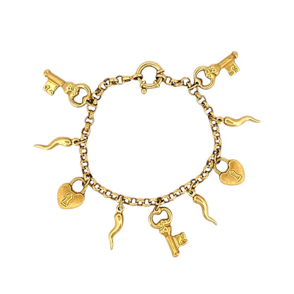Comprar pulsera realizada en oro amarillo de 18kt con colgantes en forma de llaves y candados. Cierre tipo marinero. Joyas segunda mano. Joyería Ian'Or.