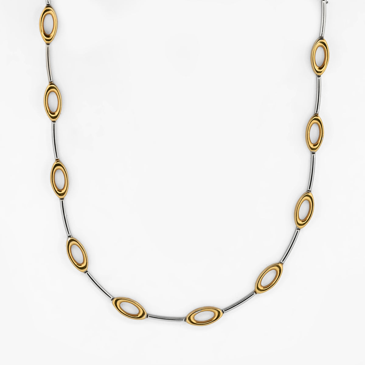 Comprar collar semirrígido realizado en oro blanco y amarillo de 18kt. Cierre de cajón y un brazo de seguridad. Joyería Compro Oro Barcelona. Ian'Or.