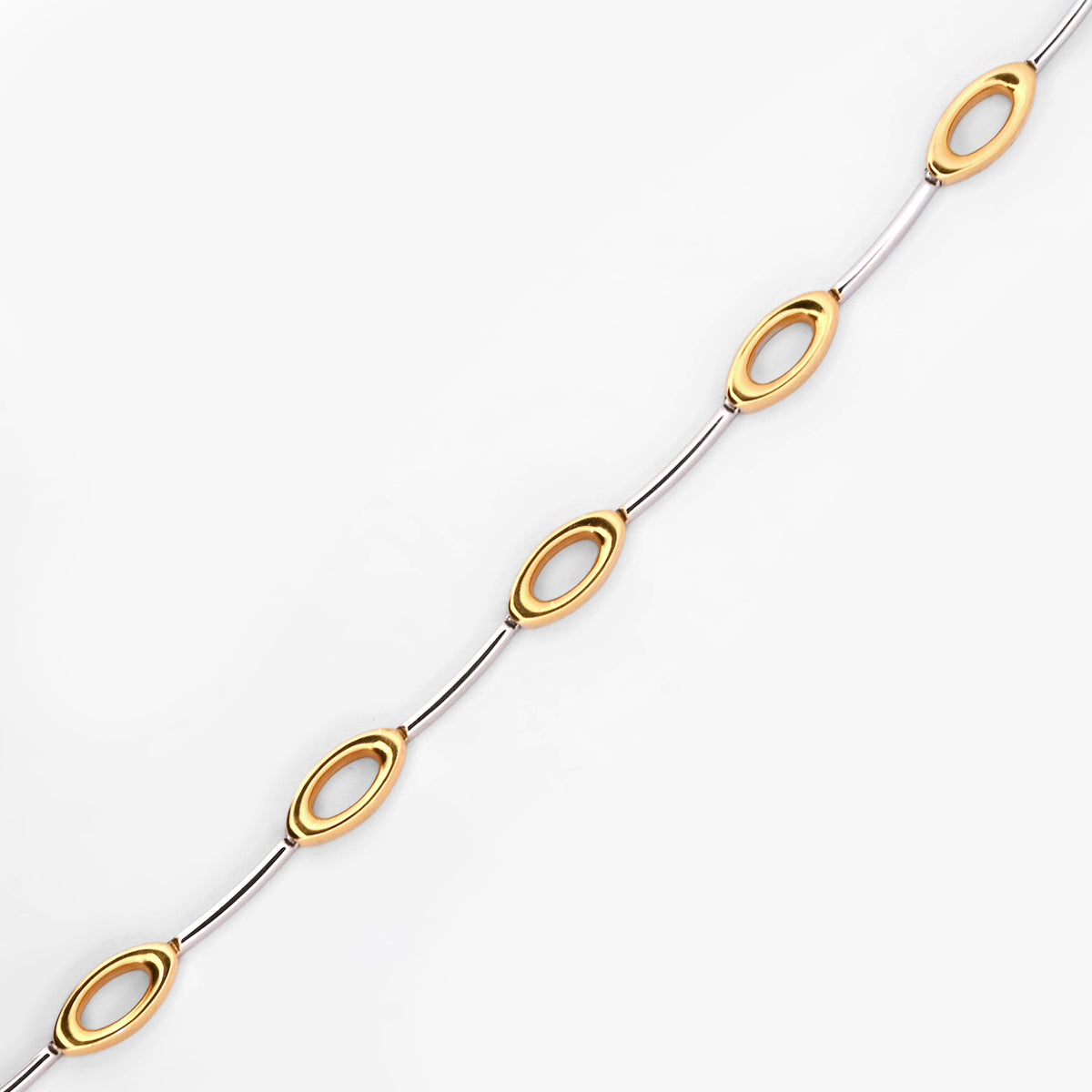 Comprar collar semirrígido realizado en oro blanco y amarillo de 18kt. Cierre de cajón y un brazo de seguridad. Joyería Compro Oro Barcelona. Ian'Or.