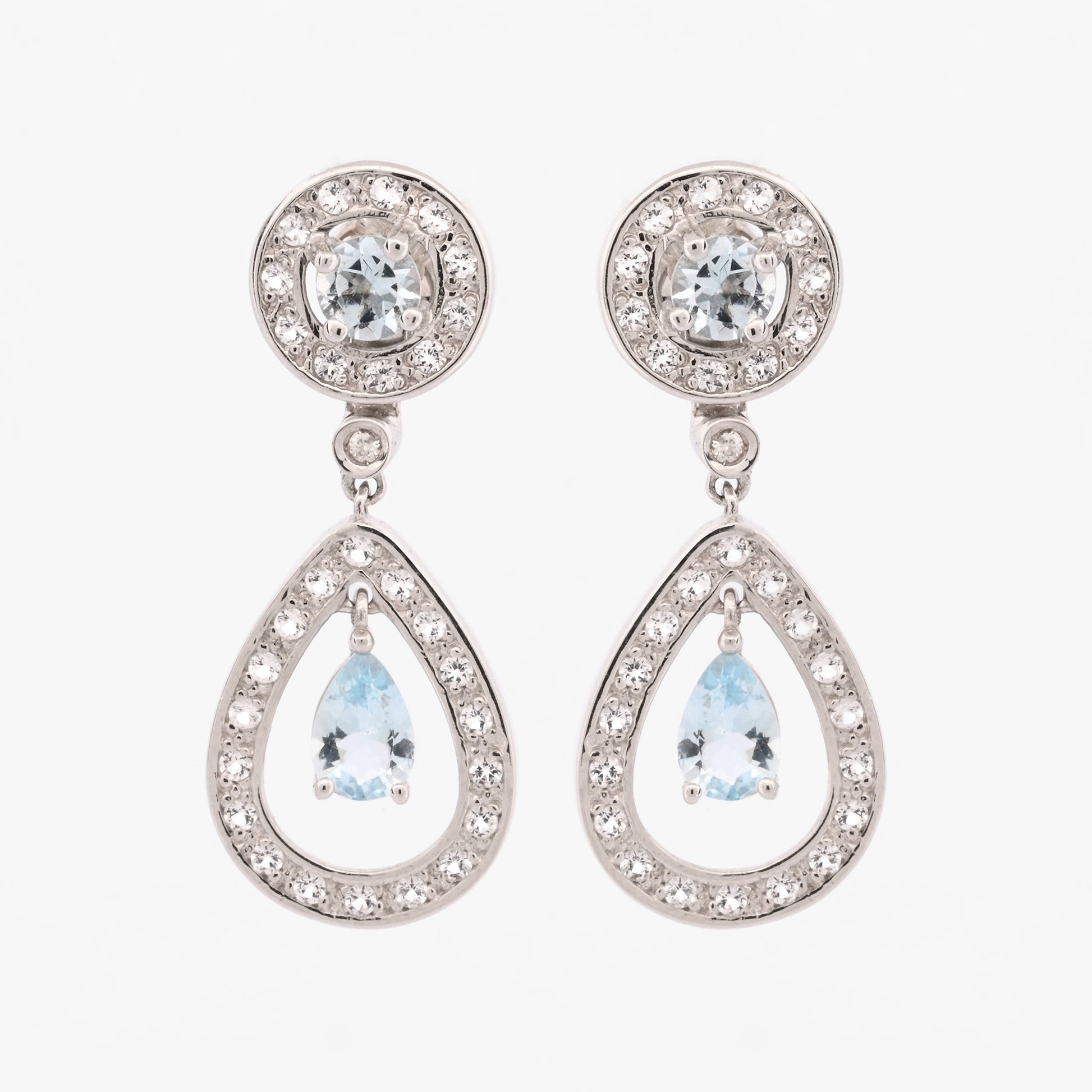 Comprar pendientes largos de oro blanco de 18kt con diamantes talla brillante y aguas marinas. Joyas con aguamarinas. Joyería Ian'Or. Envío GRATIS.