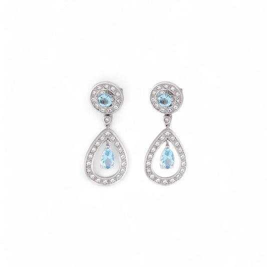 Comprar pendientes largos de oro blanco de 18kt con diamantes talla brillante y aguas marinas. Joyas con aguamarinas. Joyería Ian'Or. Envío GRATIS.

