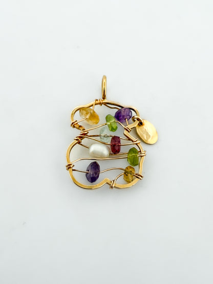 Comprar colgante TOUS de oro amarillo de 18kt con forma de osito y piedras de colores. Joyas Tous segunda mano. Restauramos joyas para darles una nueva vida.

