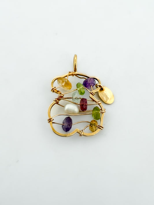 Comprar colgante TOUS de oro amarillo de 18kt con forma de osito y piedras de colores. Joyas Tous segunda mano. Restauramos joyas para darles una nueva vida.

