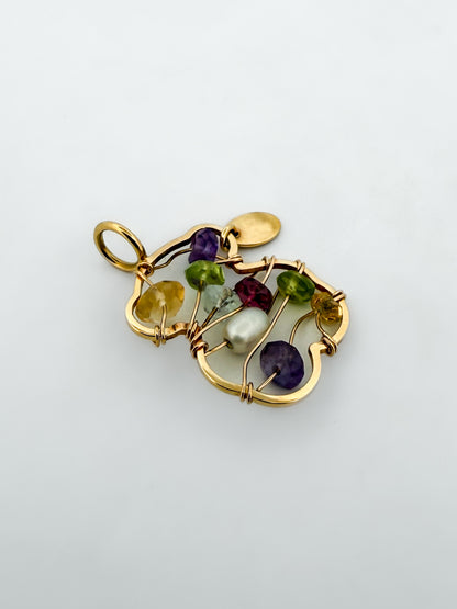 Comprar colgante TOUS de oro amarillo de 18kt con forma de osito y piedras de colores. Joyas Tous segunda mano. Restauramos joyas para darles una nueva vida.

