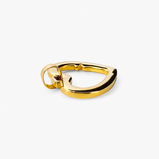 Comprar Colgante  TOUS en forma de corazón realizado en oro amarillo de 18kt. Congrabado del icónico osito de la marc  y la palabra Amor. Venta de joyas Tous segunda mano
