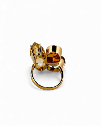 Comprar anillo realizado en oro amarillo de 18kt con citrino central y diamantes talla brillante y marquesa alrededor de el y en los brazos. Envío GRATIS.