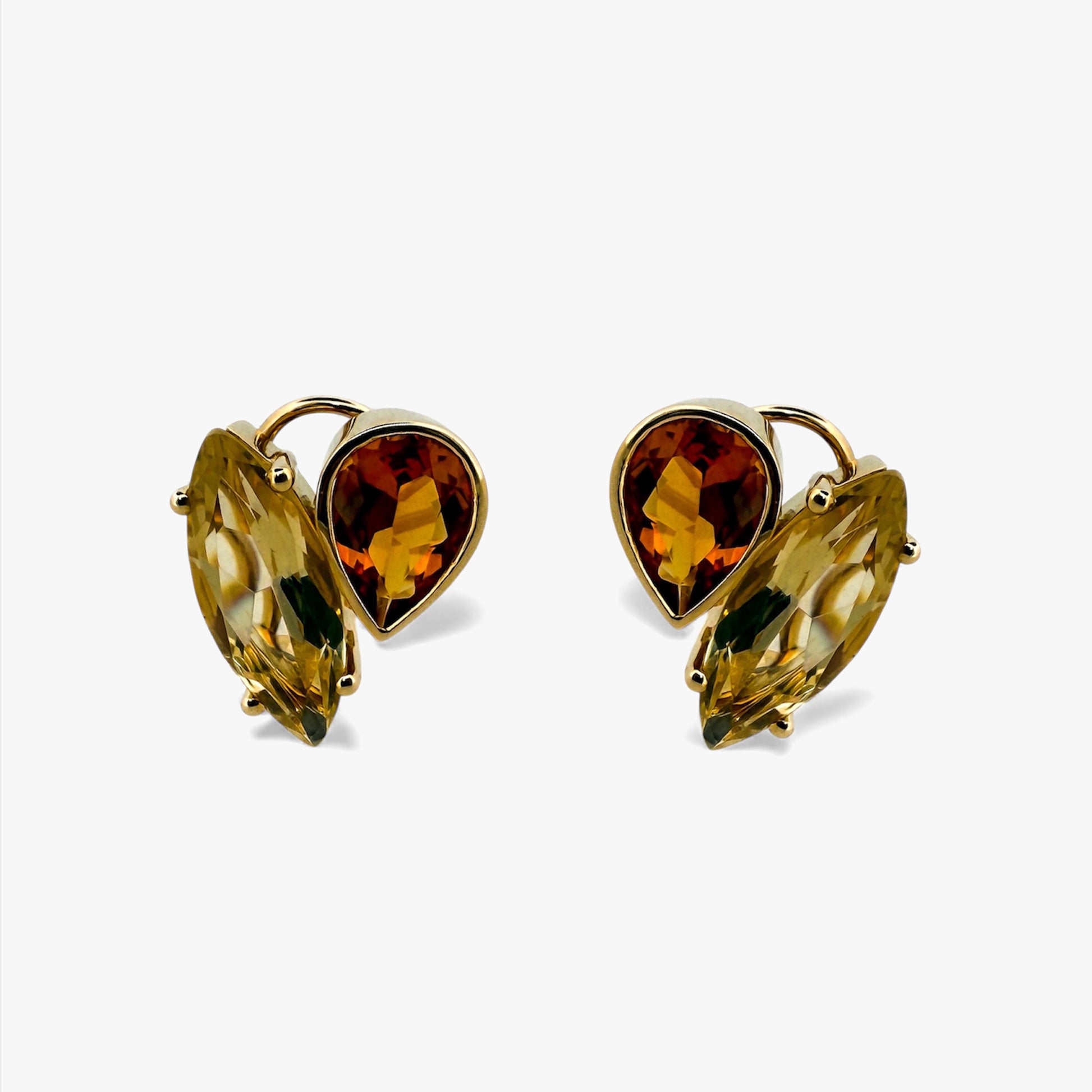 Pendientes realizados en oro amarillo con 2 citrinos talla maquise y per con cierre tipo omega. Envío GRATIS. Joyas de oro con citrinos  al mejor precio