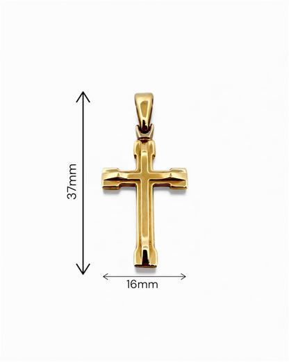 Colgante en forma de Cruz lisa realizada en oro amarillo de 18kt . Mide 3,7cm de largo y 1,6cm de ancho. Cruces de oro 18kt baratas