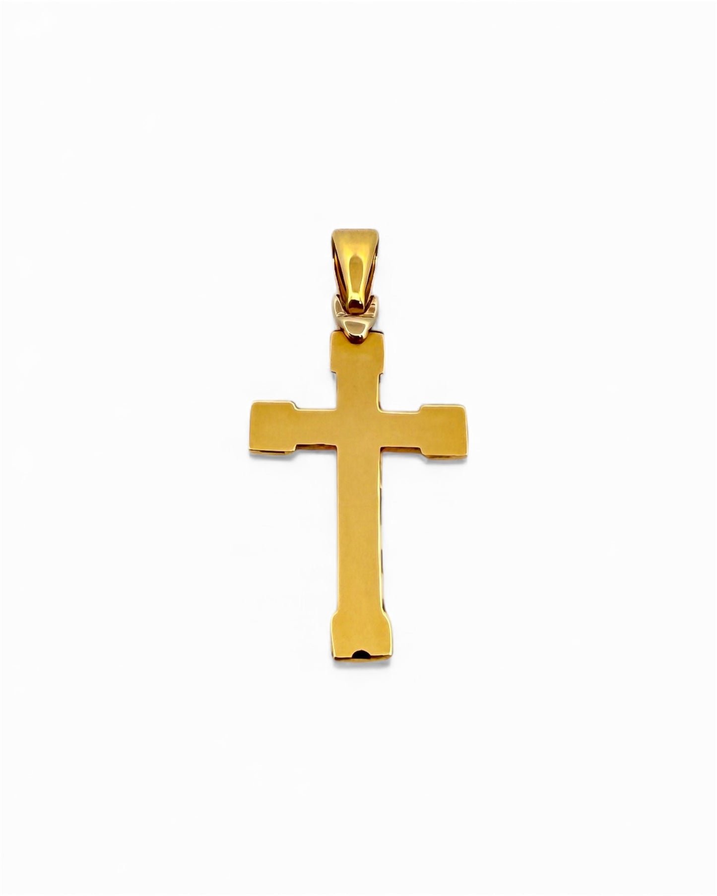 Colgante en forma de Cruz lisa realizada en oro amarillo de 18kt . Mide 3,7cm de largo y 1,6cm de ancho. Cruces de oro 18kt baratas
