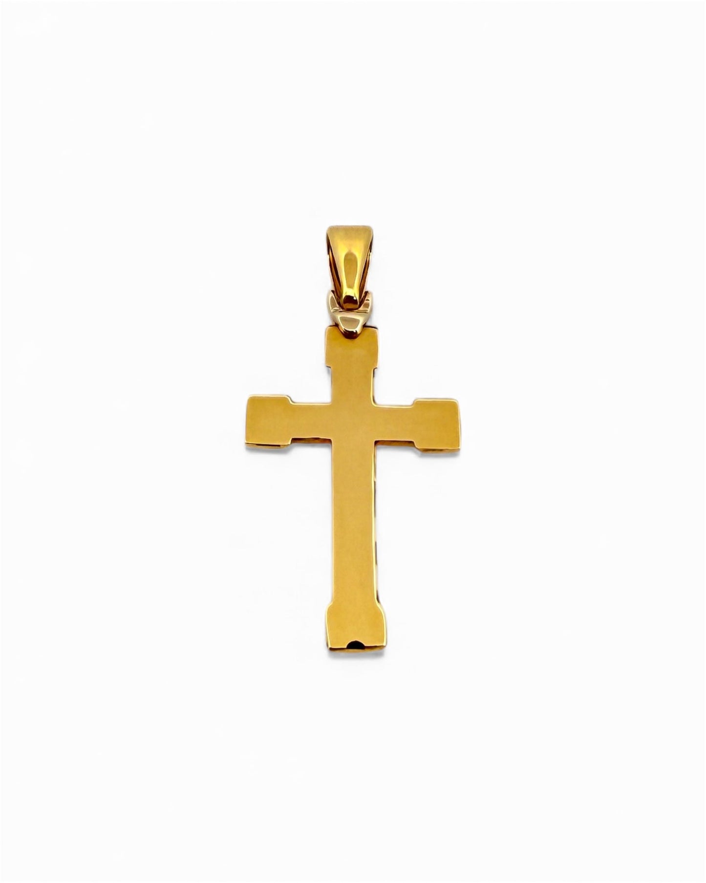 Colgante en forma de Cruz lisa realizada en oro amarillo de 18kt . Mide 3,7cm de largo y 1,6cm de ancho. Cruces de oro 18kt baratas