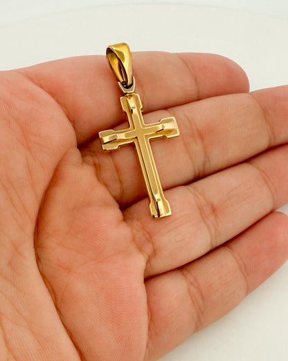 Colgante en forma de Cruz lisa realizada en oro amarillo de 18kt . Mide 3,7cm de largo y 1,6cm de ancho. Cruces de oro 18kt baratas