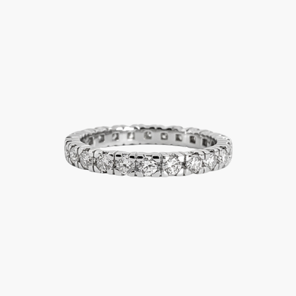 Comprar alianza entera realizada de platino con carril de 24 diamantes talla brillante con engaste en 4 grapas. Joyas de platino y diamantes vintage baratas.