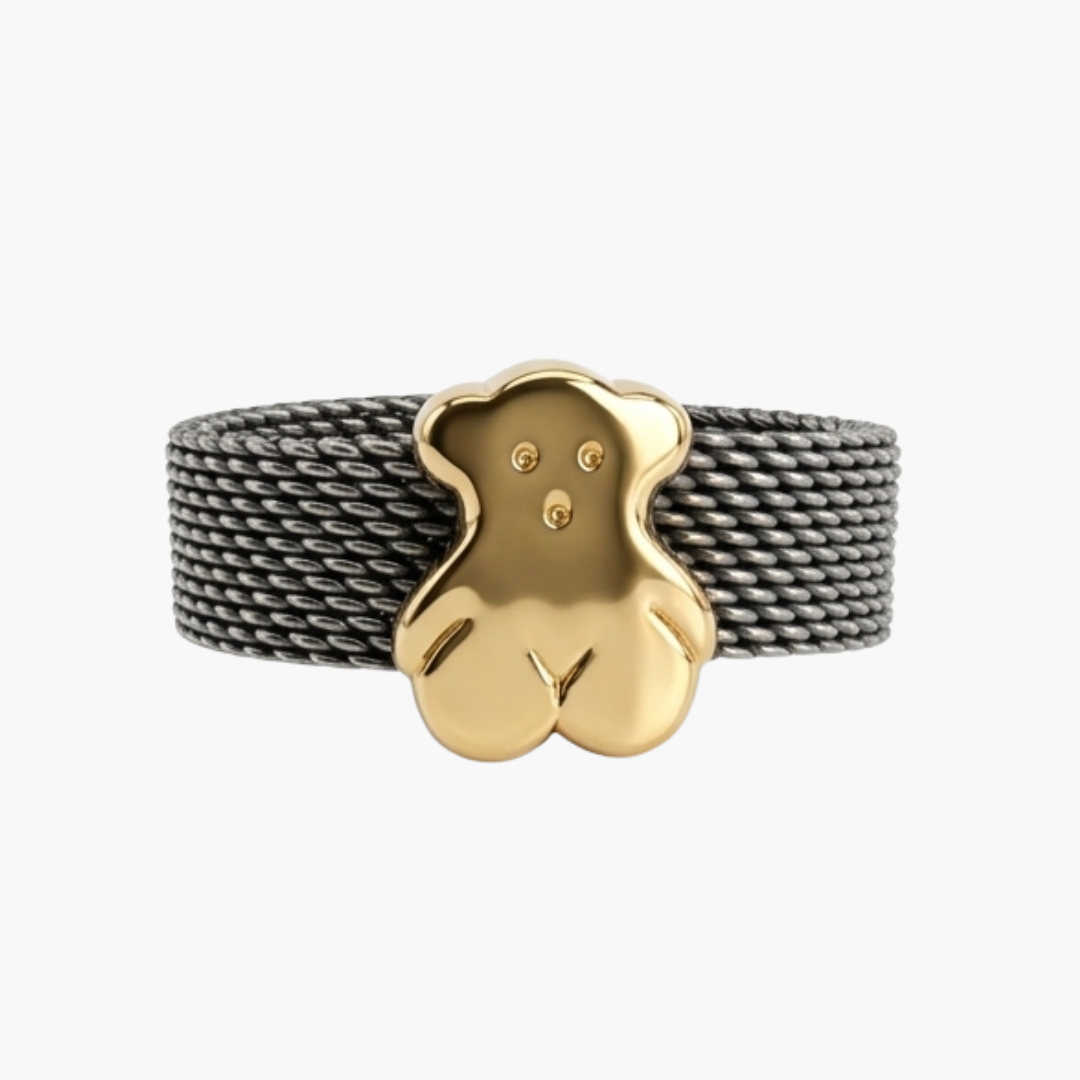 Comprar anillo original de TOUS realizado con el característico tejido de malla en acero y oso icónico de la marca en oro amarillo de 18kt. Ian'Or