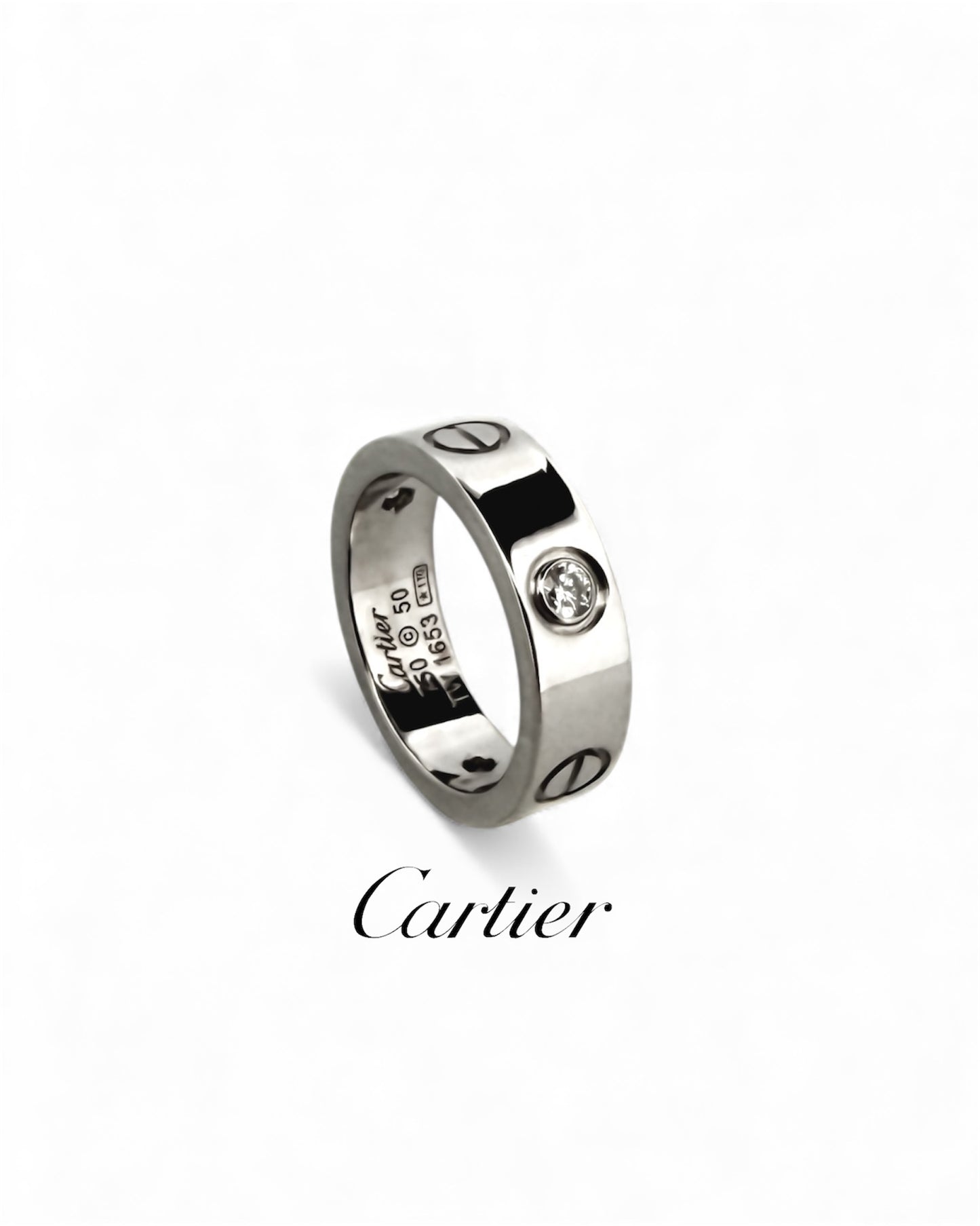 Anillo original de la prestigiosa firma Cartier de la colección LOVE realizada en oro blanco con engaste de 3 brillantes. Joyas Cartier Originales
